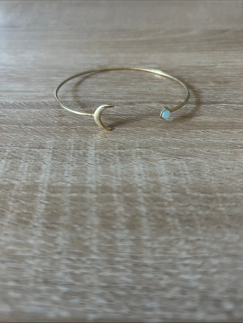 Gold Crescent Moon Open Bangle Bracelet with Light Blue Stone